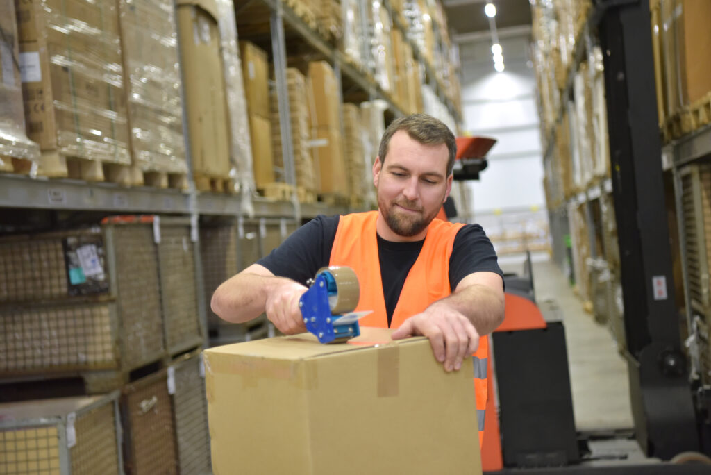 warehouse employee operating in clean environment