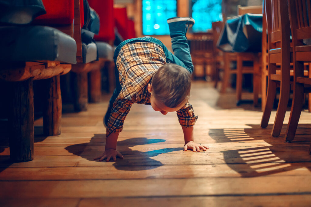 clean restaurant floor with child playing